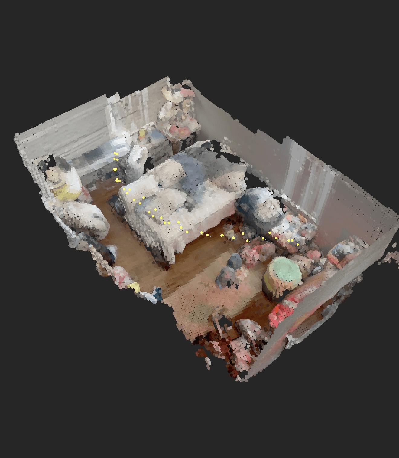 Colorized 3D point-cloud capture of a living room with a sofa, viewed from above, with the scan camera path shown as a dotted line